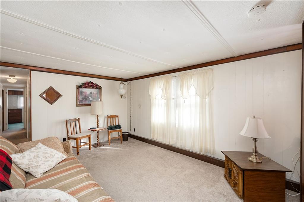 130 Kaiser Road Butler, PA 16002 - Photo 5 of 24 a living room with furniture and a window