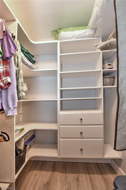 18426 Hepatica Road Fort Myers, FL 33967 - Photo 15 of 32 Primary bedroom walk in closet.