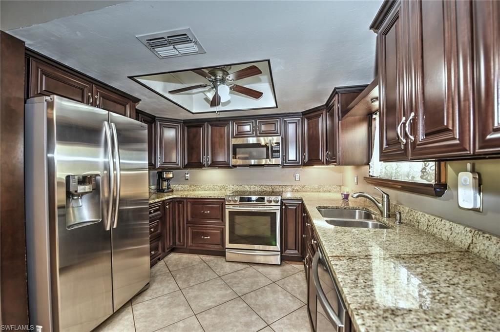 18426 Hepatica Road Fort Myers, FL 33967 - Photo 2 of 32 kitchen