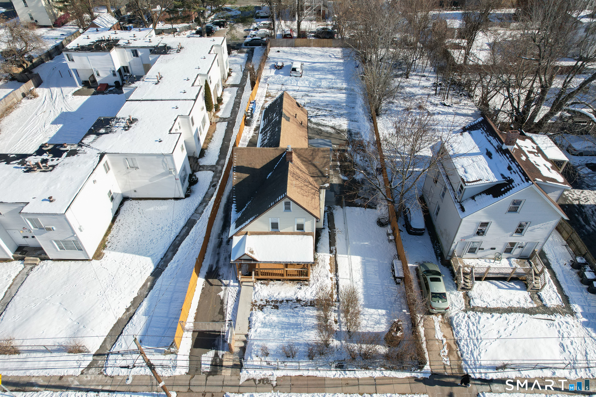 218 Martin Street Hartford, CT 06120 - Photo 1 of 38 an aerial view of residential houses with outdoor space
