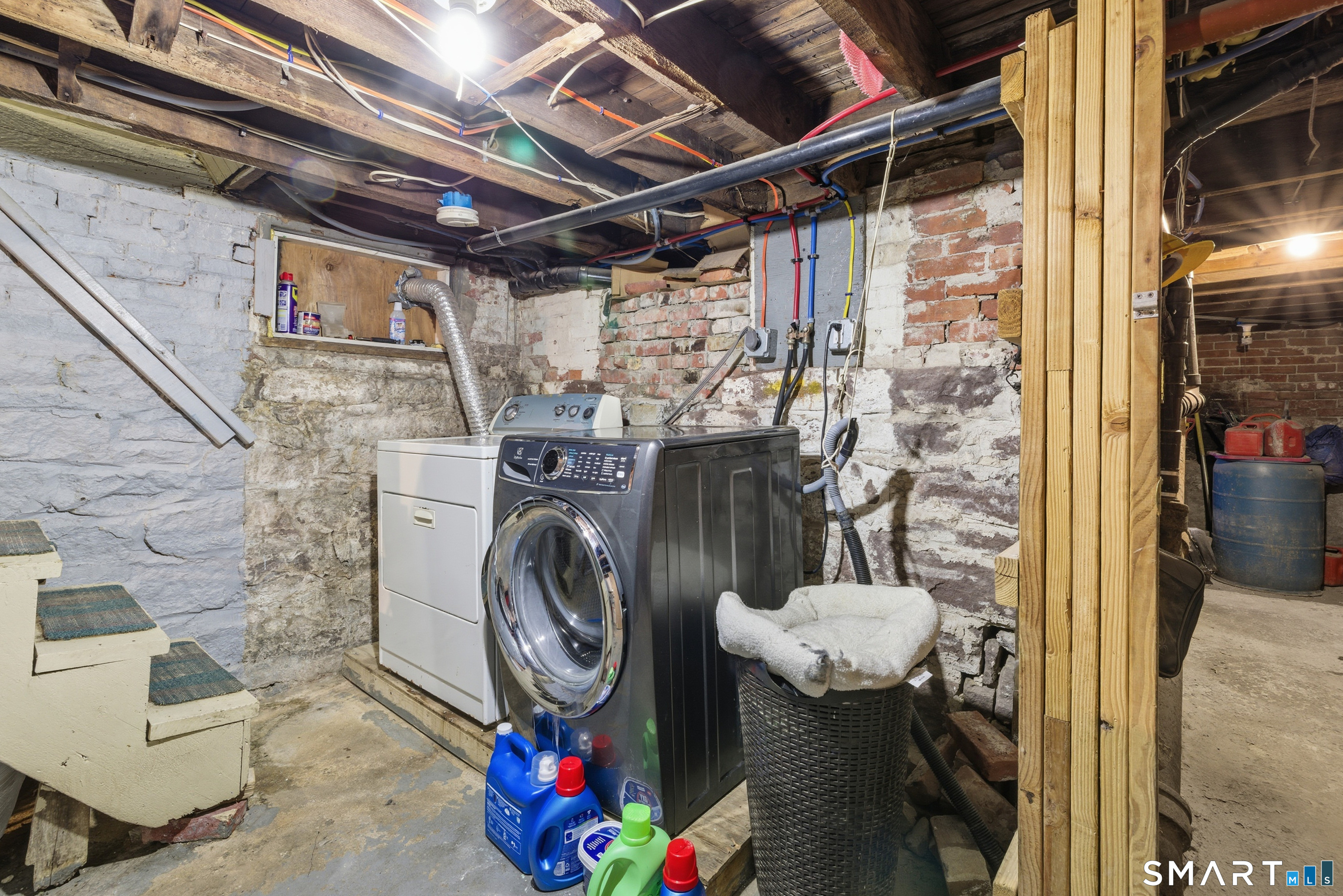 218 Martin Street Hartford, CT 06120 - Photo 23 of 38 a utility room with dryer and washer