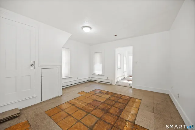 an empty room with window