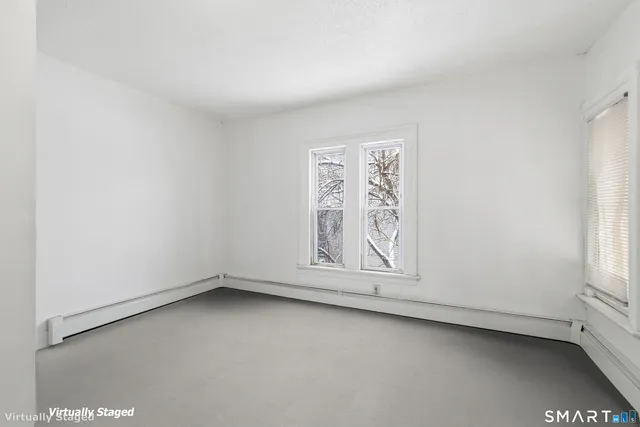 an empty room with windows