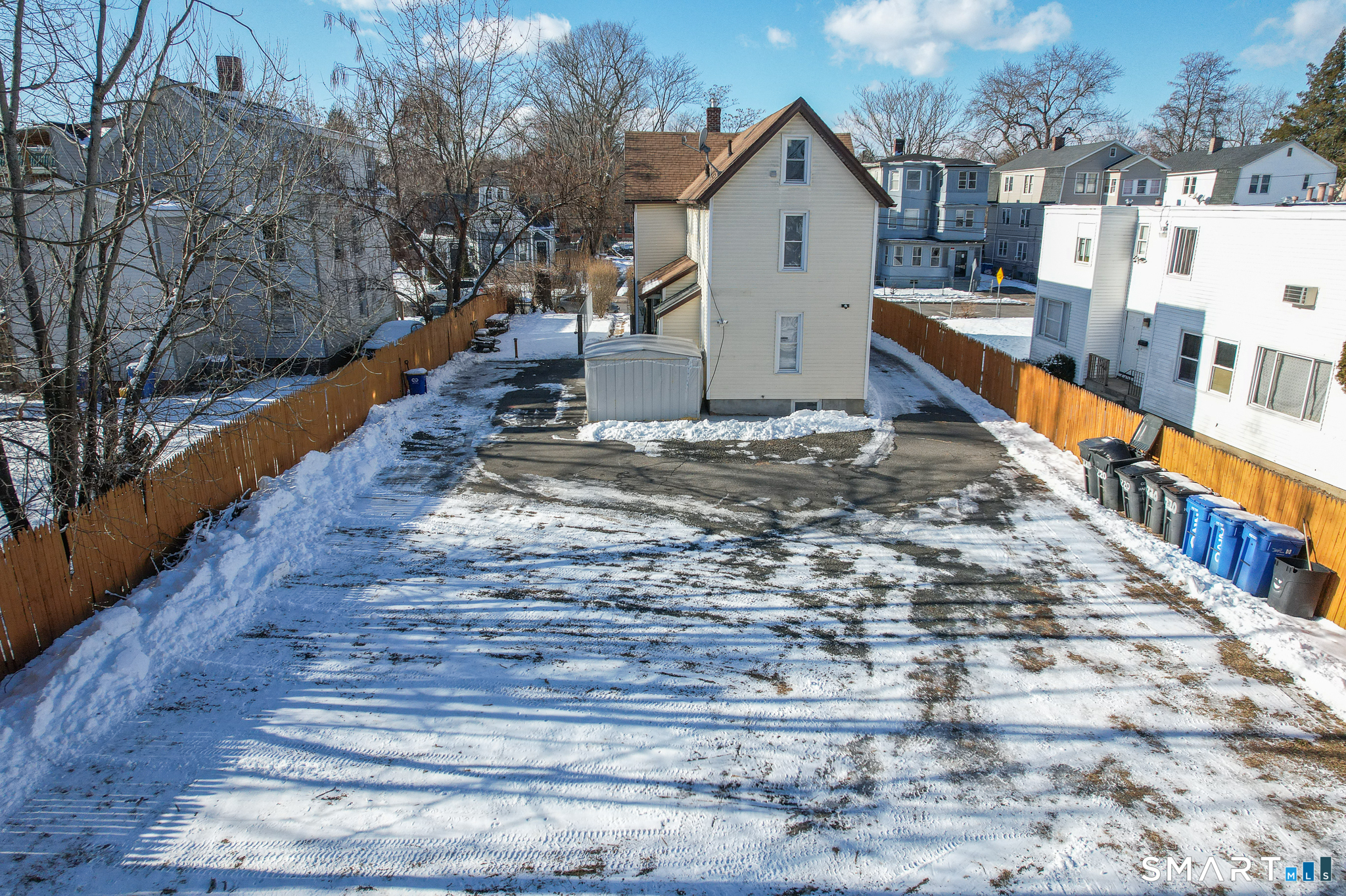 218 Martin Street Hartford, CT 06120 - Photo 3 of 38 a view of a house with backyard and trees