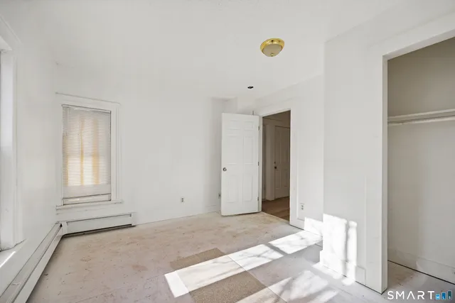 an empty room with windows