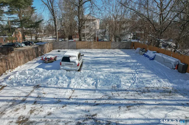 a view of a yard with a bench