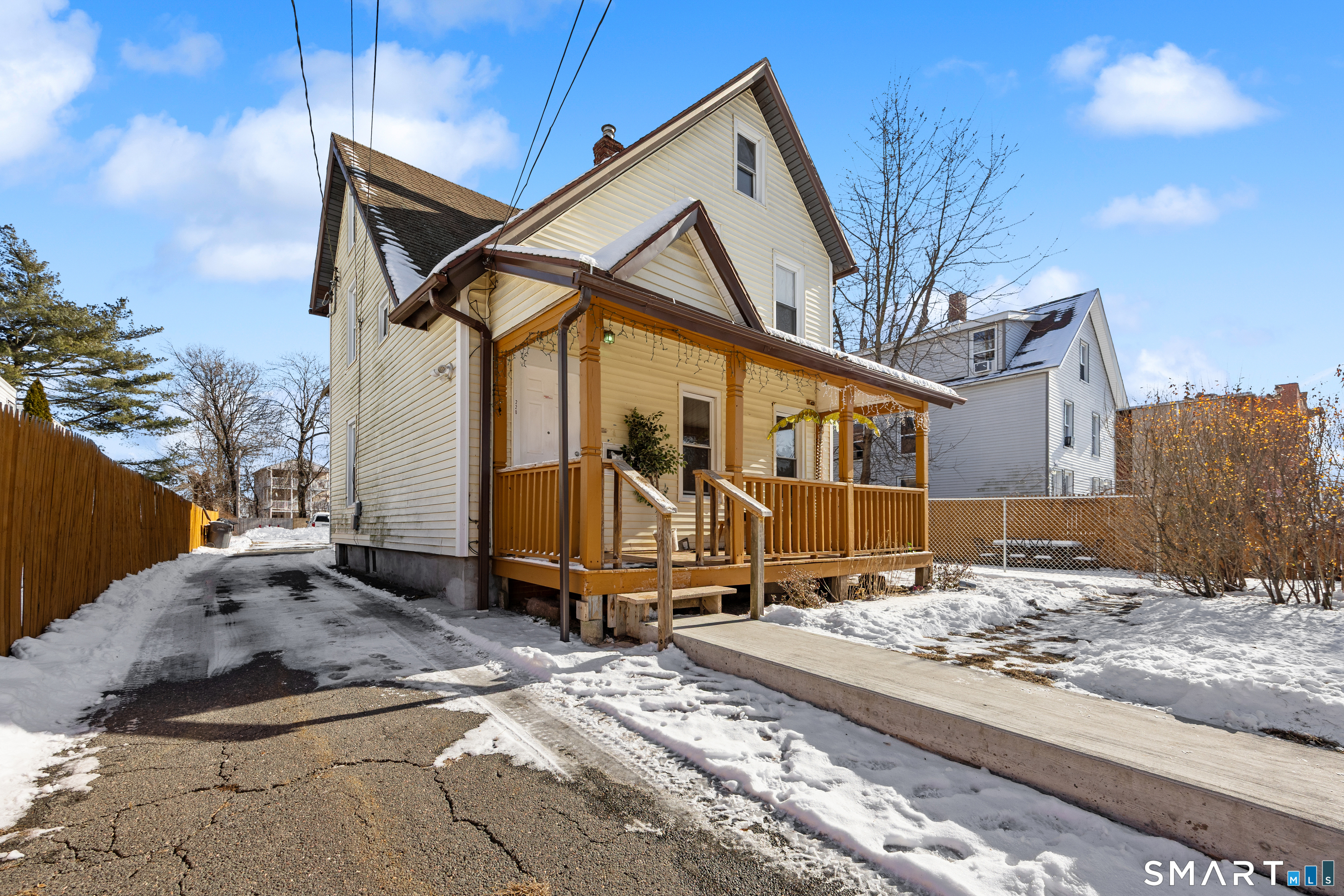 218 Martin Street Hartford, CT 06120 - Photo 6 of 38 a view of a house with a yard