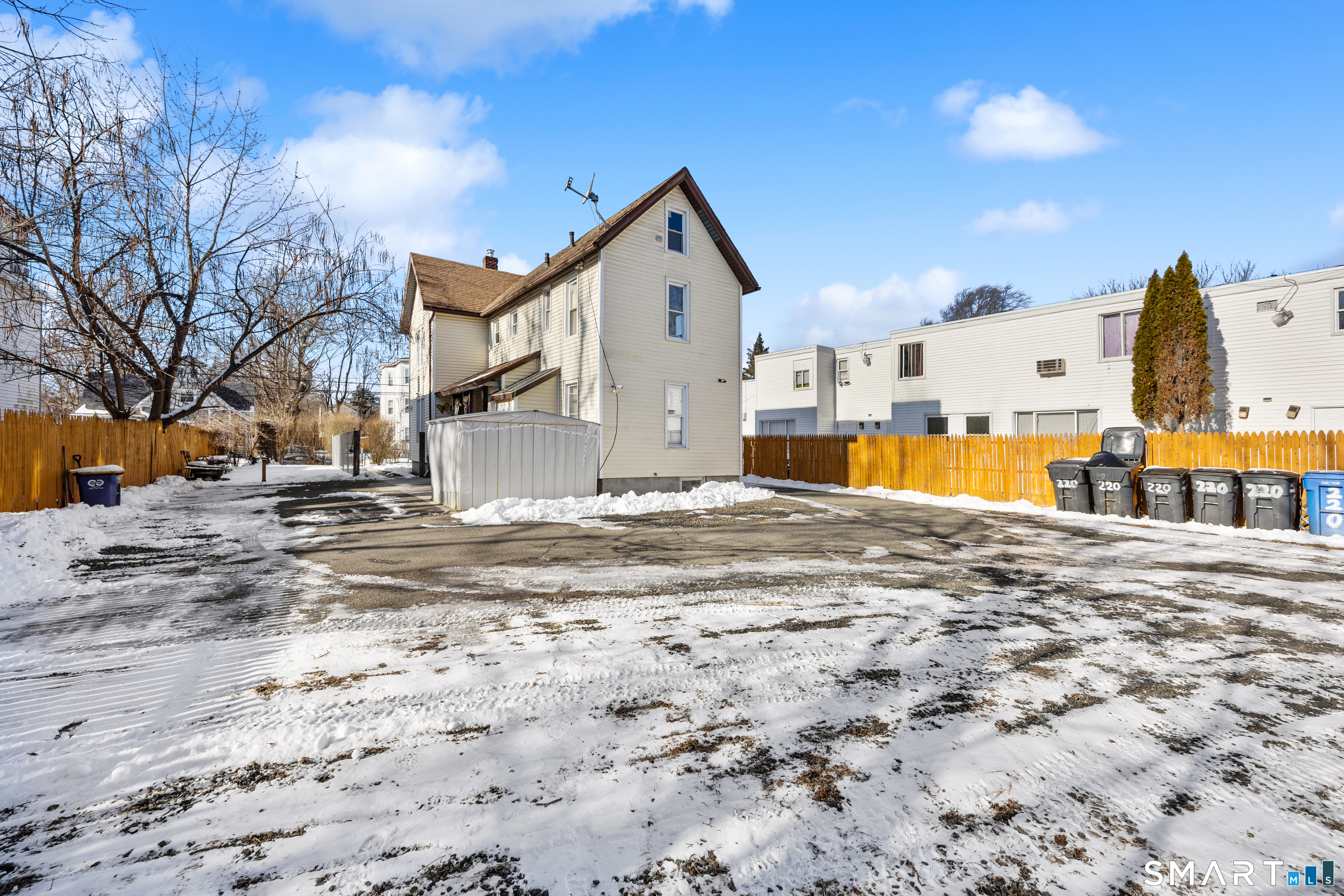 218 Martin Street Hartford, CT 06120 - Photo 7 of 38 a view of a house with a yard