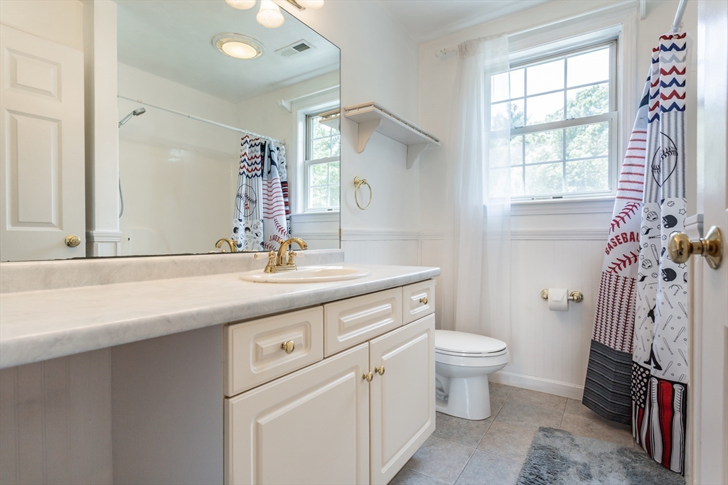 39 Nachaomet Road Lakeville, MA 02347 - Photo 24 of 42 a bathroom with a sink a toilet and a mirror