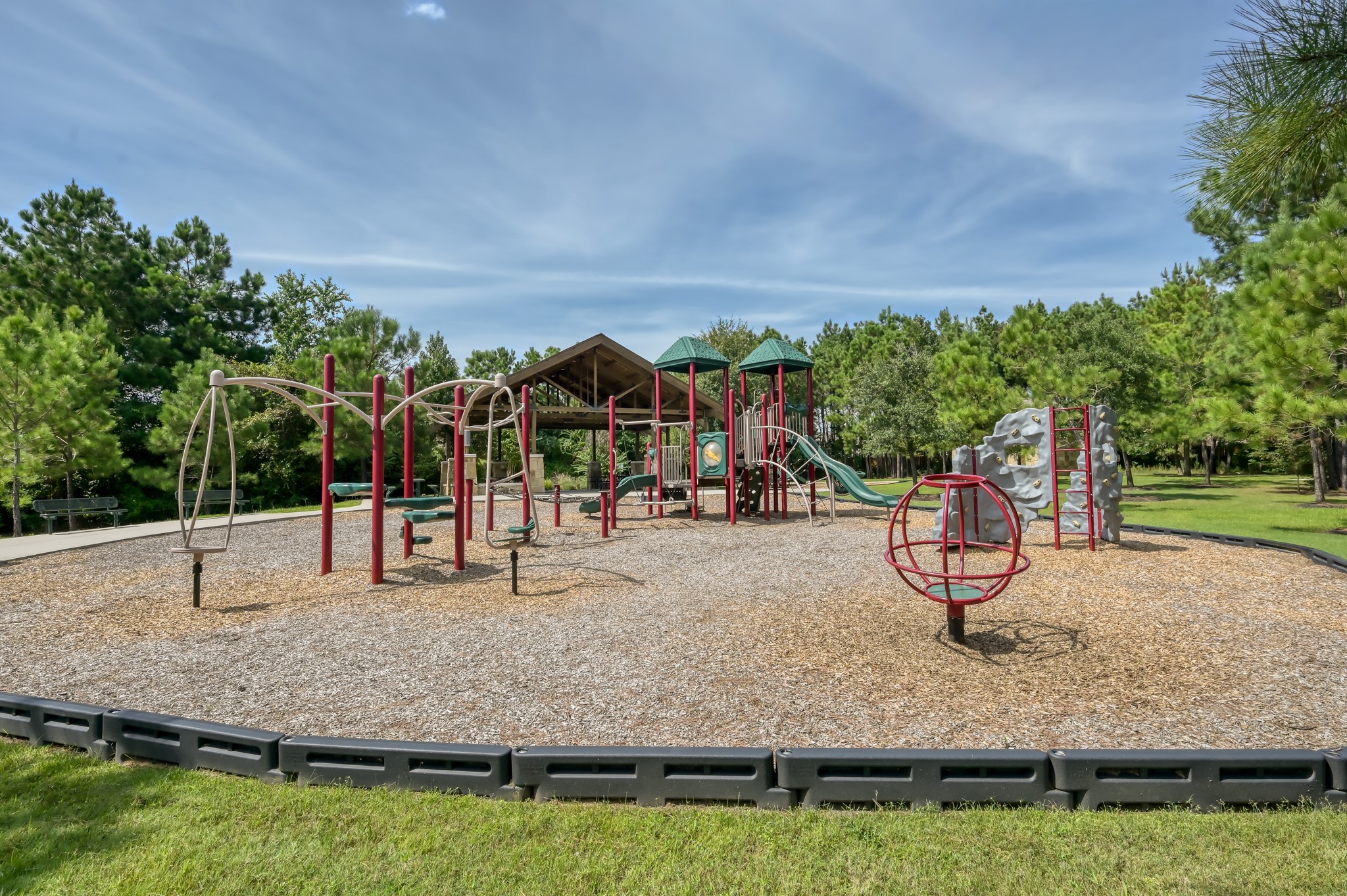 7562 Fettle Lane Conroe, TX 77304 - Photo 28 of 30 Community playground and recreational area providing fun outdoor space for all ages.