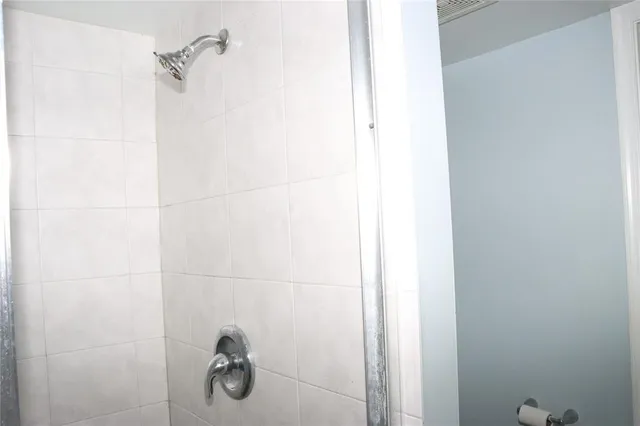 a bathroom with a sink and a window
