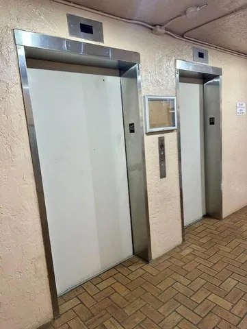 a view of swimming pool with outdoor seating and plants