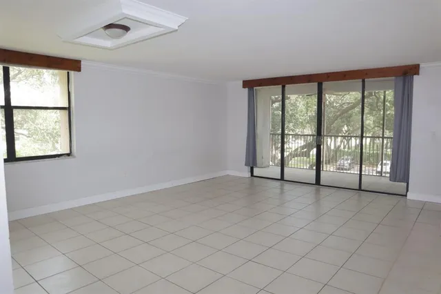 an empty room with windows