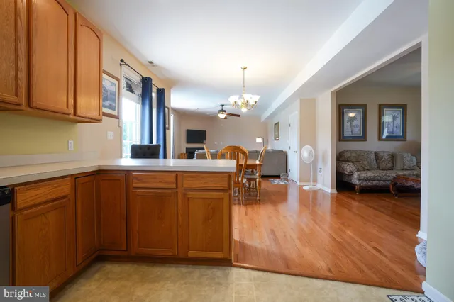 a kitchen with sink and cabinets