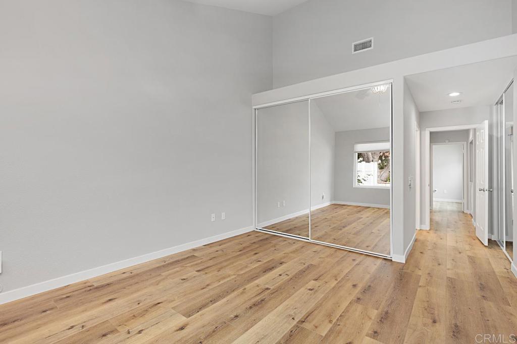 4710 Galicia Way Oceanside, CA 92056 - Photo 16 of 46 a view of wooden floor in an empty room