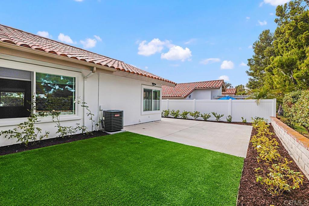 4710 Galicia Way Oceanside, CA 92056 - Photo 27 of 46 a view of a house with a yard porch and sitting area