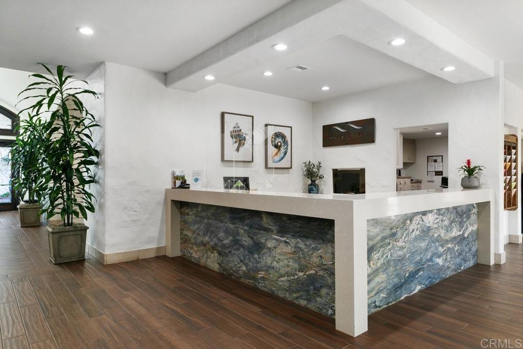 4710 Galicia Way Oceanside, CA 92056 - Photo 31 of 46 a living room with furniture and a fireplace