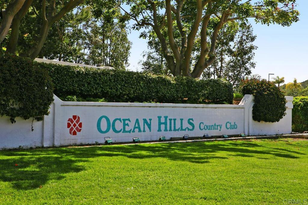 4710 Galicia Way Oceanside, CA 92056 - Photo 45 of 46 a view of outdoor space with sign board and garden