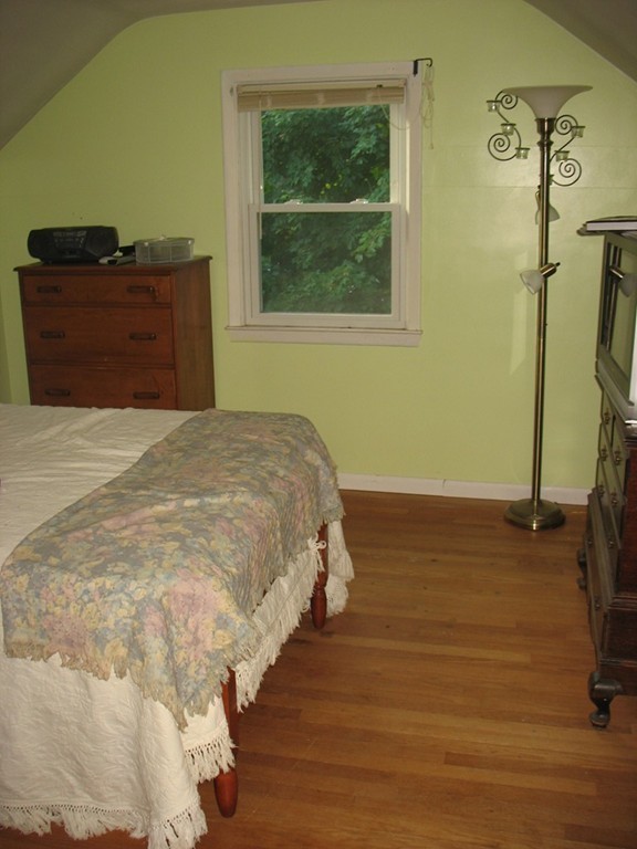 113 Somers Road Hampden, MA 01036 - Photo 16 of 25 a bedroom with a bed and a window