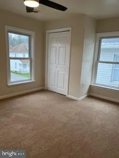an empty room with windows