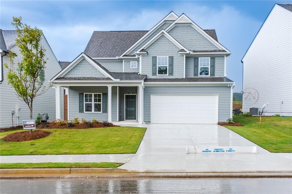 front view of a house with a yard