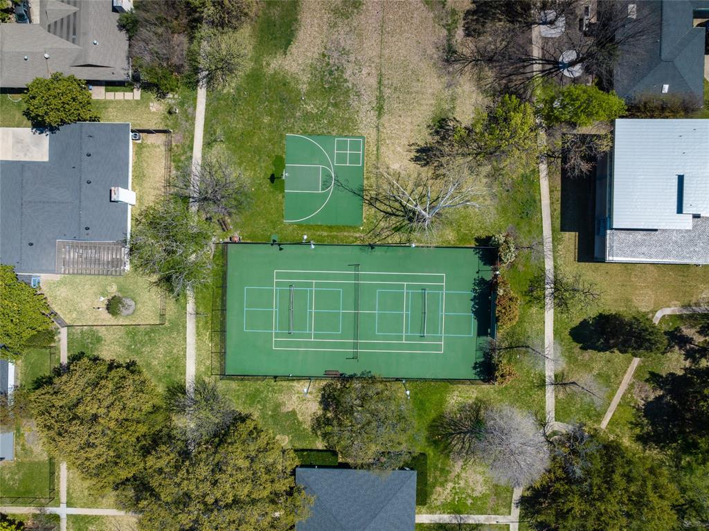 15721 Mapleview Circle Dallas, TX 75248 - Photo 40 of 40 a green field with some trees in front of it
