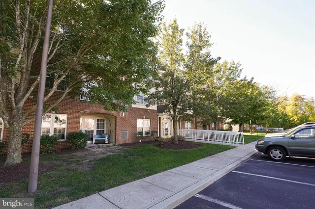 a view of a house with a garden