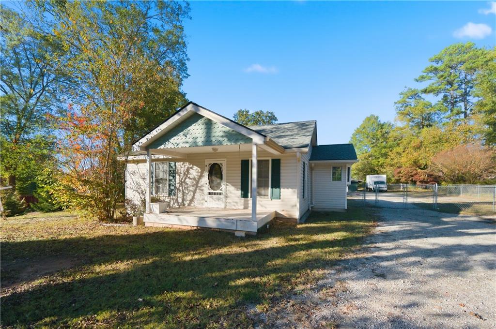 2236 Clay Road Southwest Austell, GA 30106 - Photo 1 of 1 a front view of a house with garden