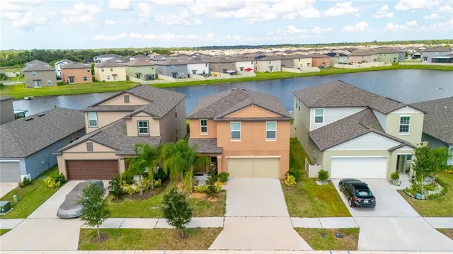an aerial view of a house with a garden space