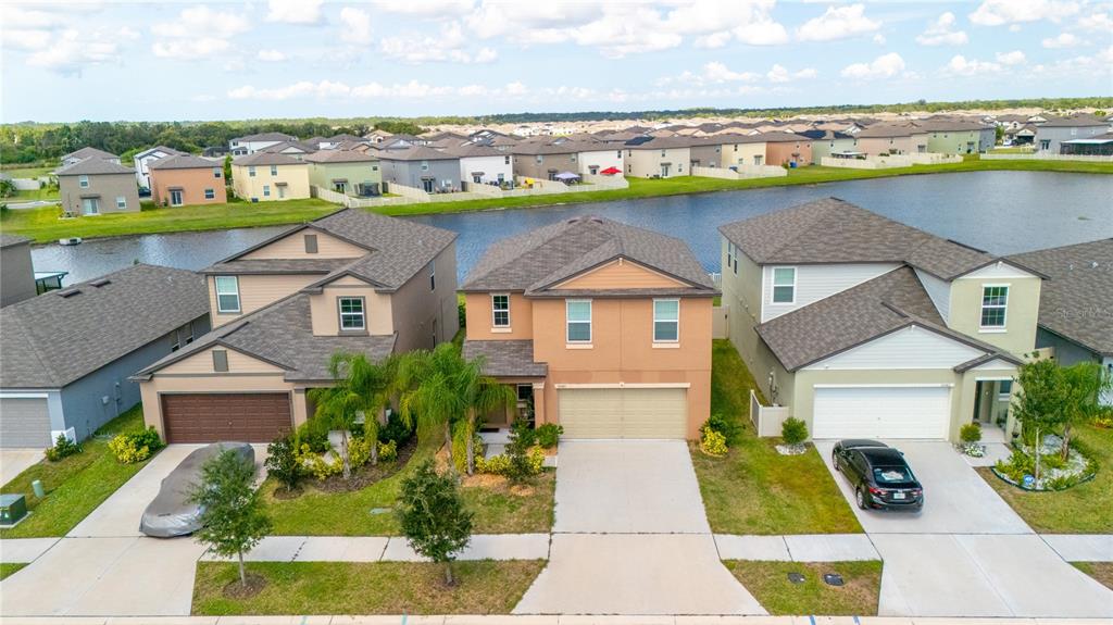 an aerial view of a house with a garden space