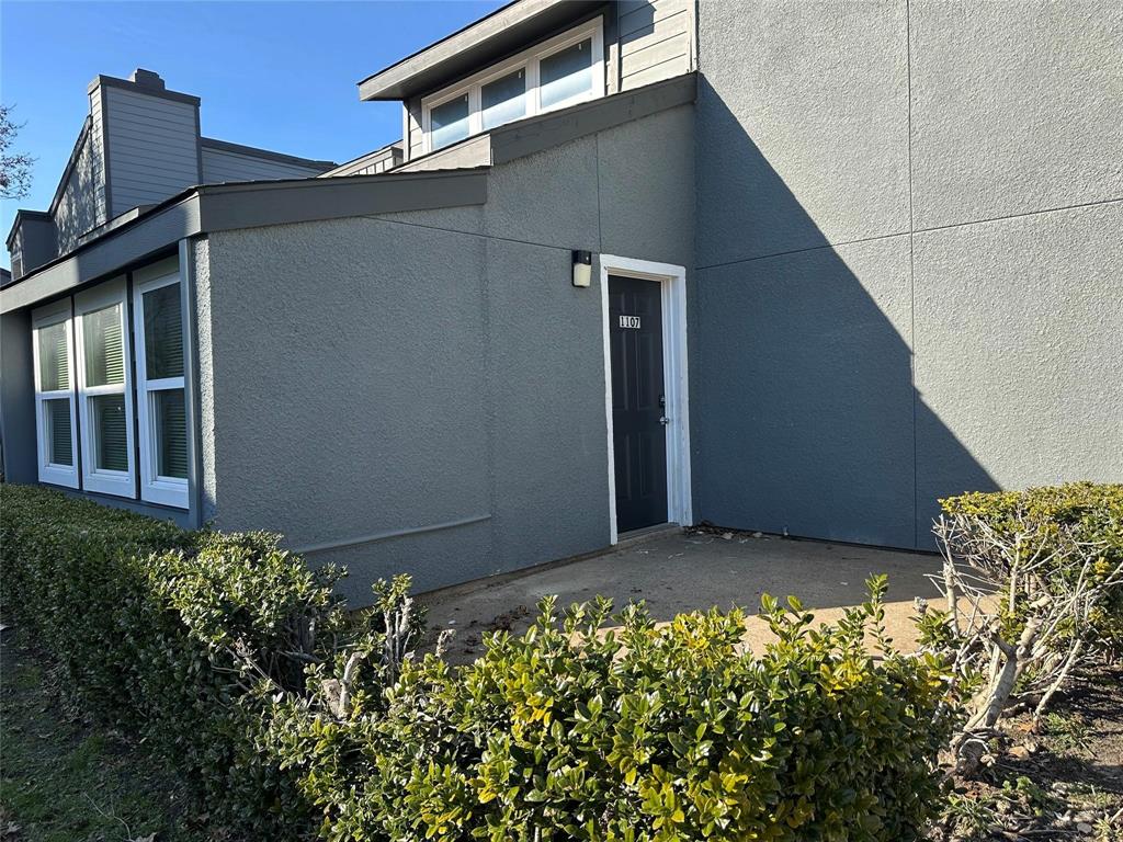9696 Walnut Street, Unit 1107 Dallas, TX 75243 - Photo 12 of 13 a backyard of a house with lots of green space