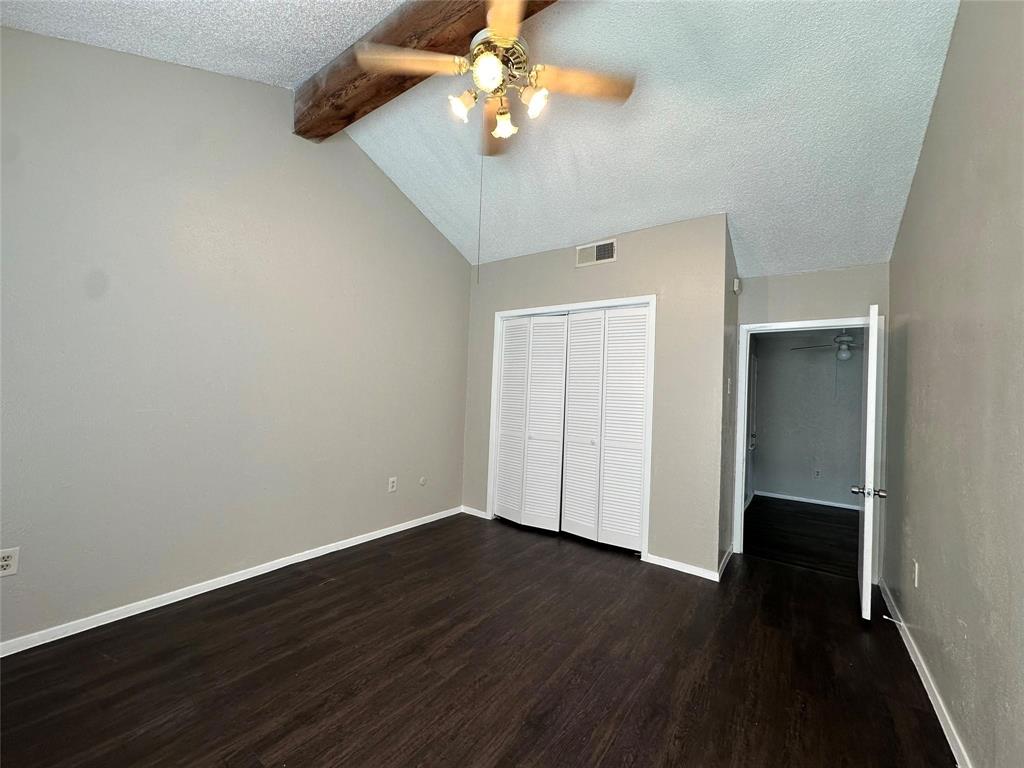 9696 Walnut Street, Unit 1107 Dallas, TX 75243 - Photo 7 of 13 a view of an empty room with wooden floor