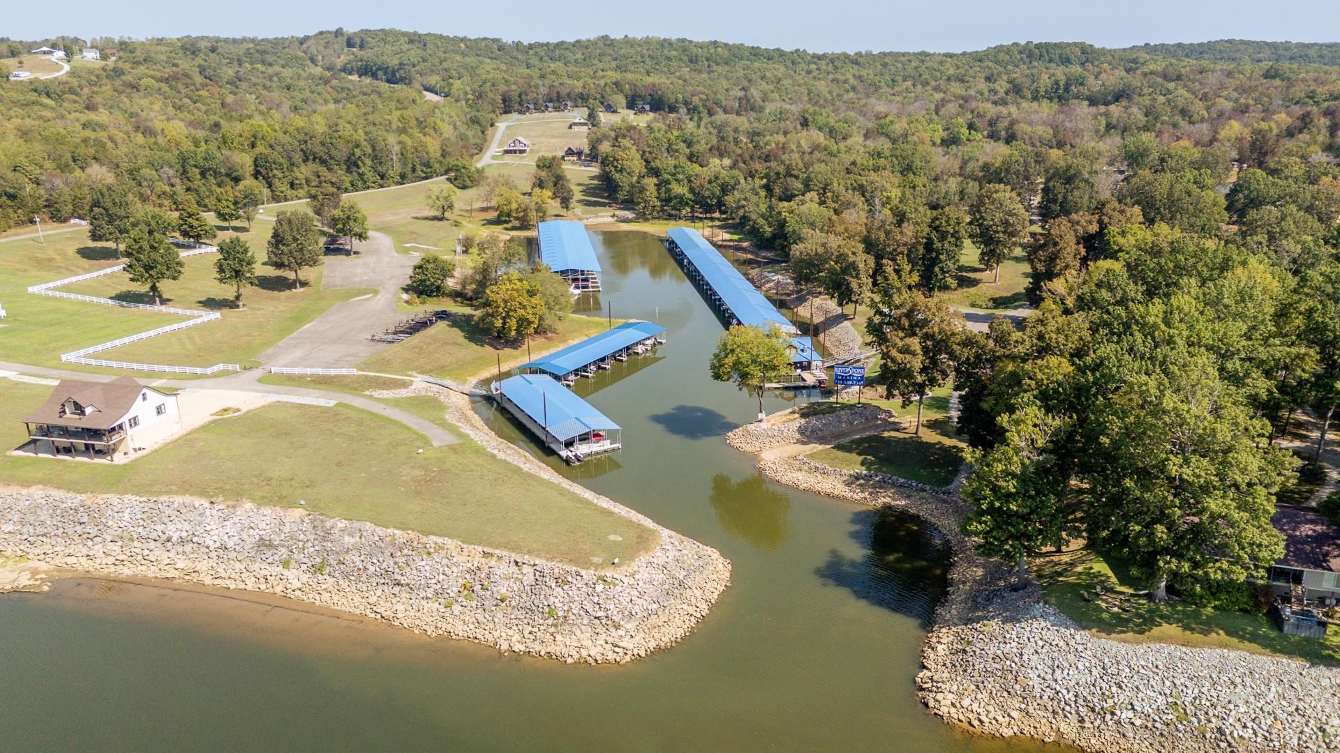 0 Mariah Lane Bath Springs, TN 38311 - Photo 19 of 38 an aerial view of residential houses with outdoor space