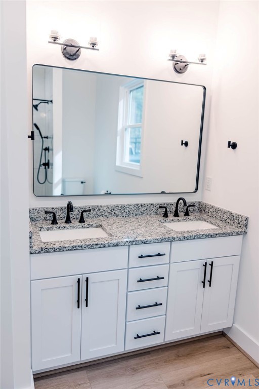 157 Barringer Lane Bumpass, VA 23024 - Photo 17 of 65 a bathroom with a granite countertop sink and a mirror