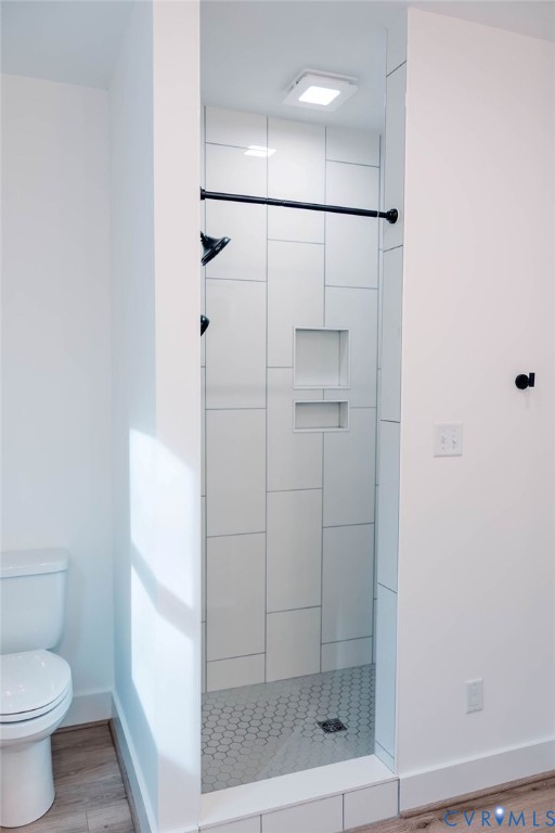 157 Barringer Lane Bumpass, VA 23024 - Photo 19 of 65 a bathroom with a shower and a toilet