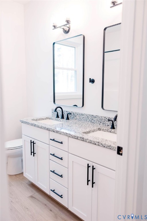 157 Barringer Lane Bumpass, VA 23024 - Photo 45 of 65 a bathroom with a granite countertop sink and a mirror