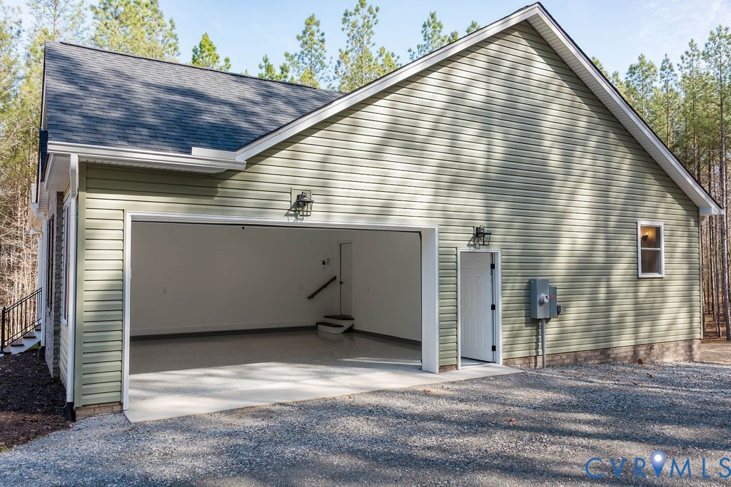 157 Barringer Lane Bumpass, VA 23024 - Photo 58 of 65 a view of a house with a garage