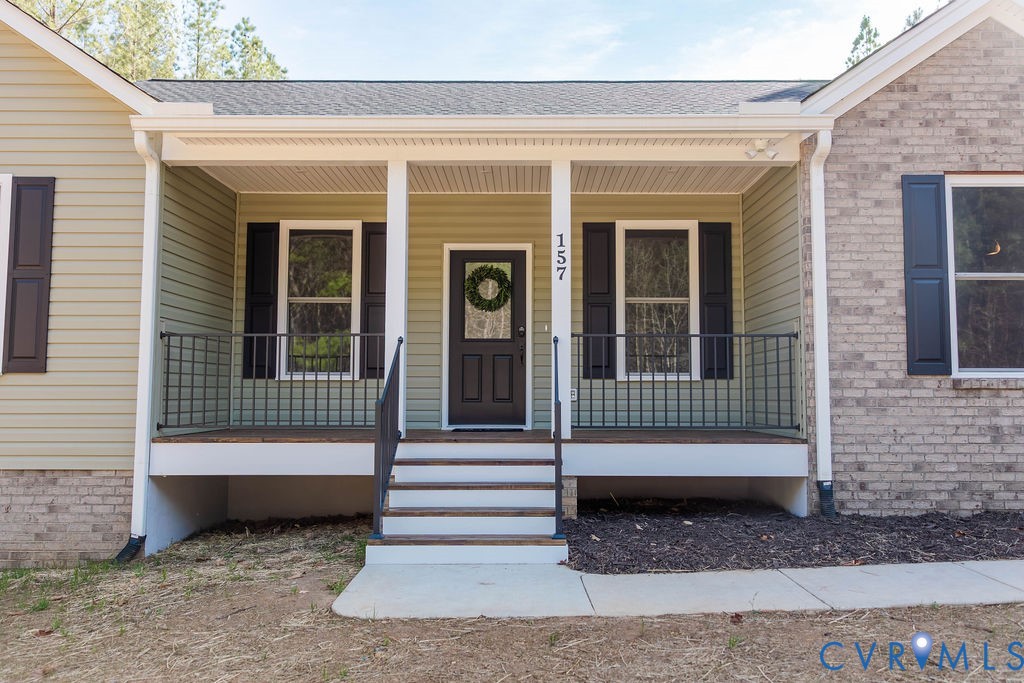 157 Barringer Lane Bumpass, VA 23024 - Photo 63 of 65 a front view of a house with a stairs