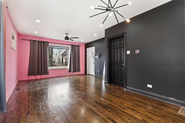a view of livingroom with hardwood floor and window
