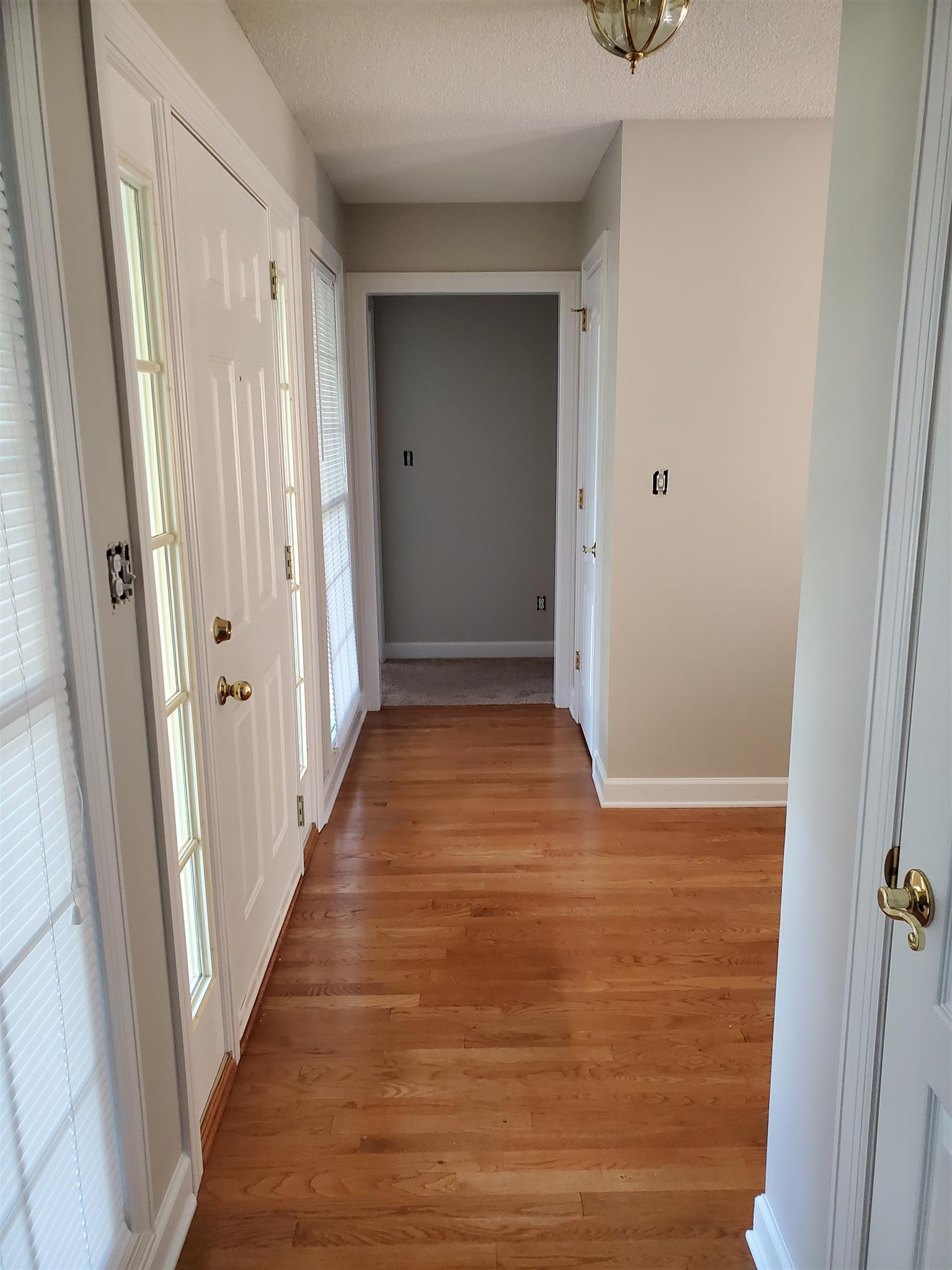 75 Eastridge Road Fayetteville, TN 37334 - Photo 5 of 25 a view of a hallway with wooden floor and staircase