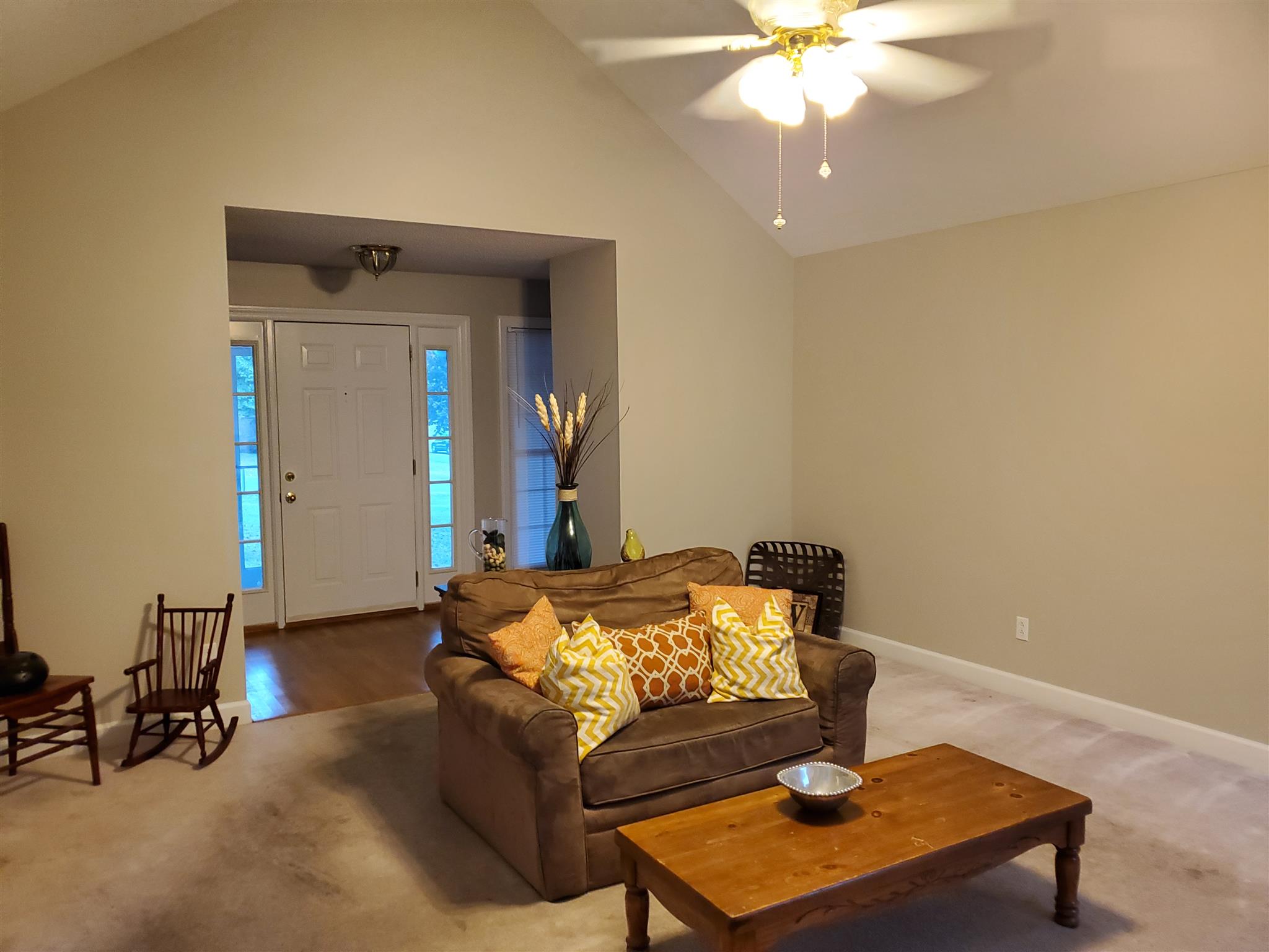75 Eastridge Road Fayetteville, TN 37334 - Photo 8 of 25 a bedroom with a bed and a chandelier
