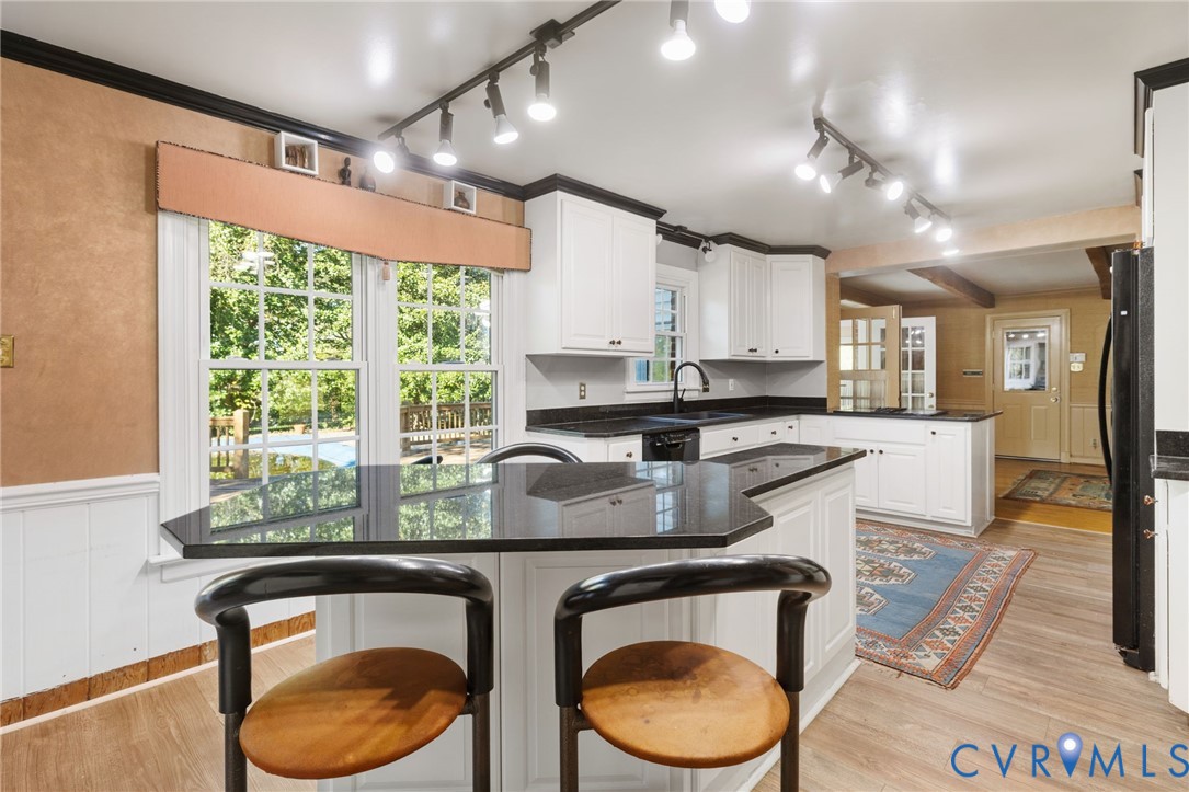 5212 Beddington Road Richmond, VA 23234 - Photo 11 of 22 a kitchen with sink cabinets and window