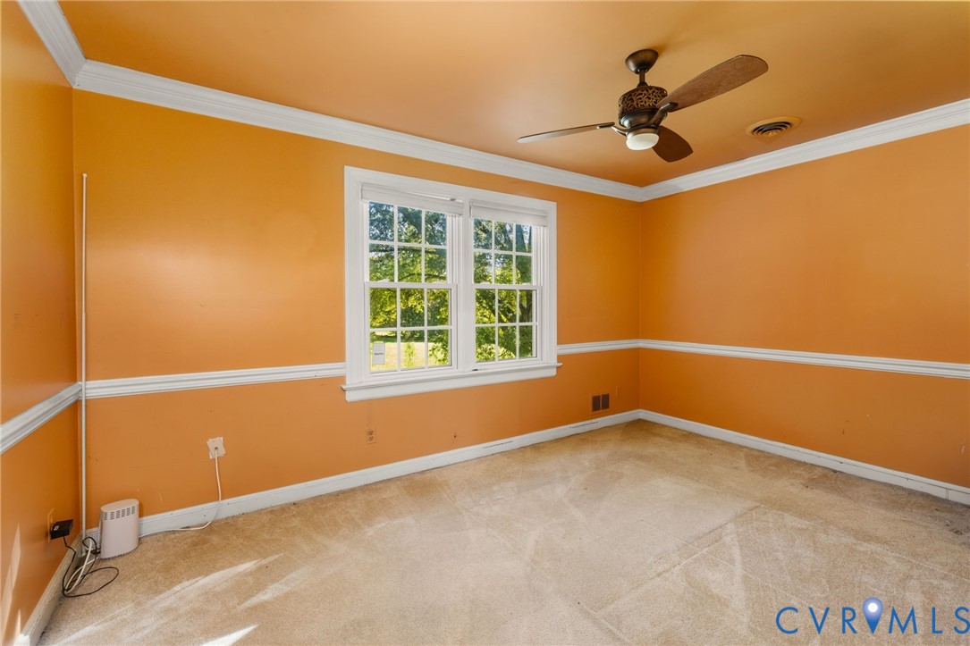 5212 Beddington Road Richmond, VA 23234 - Photo 13 of 22 a view of an empty room with a window
