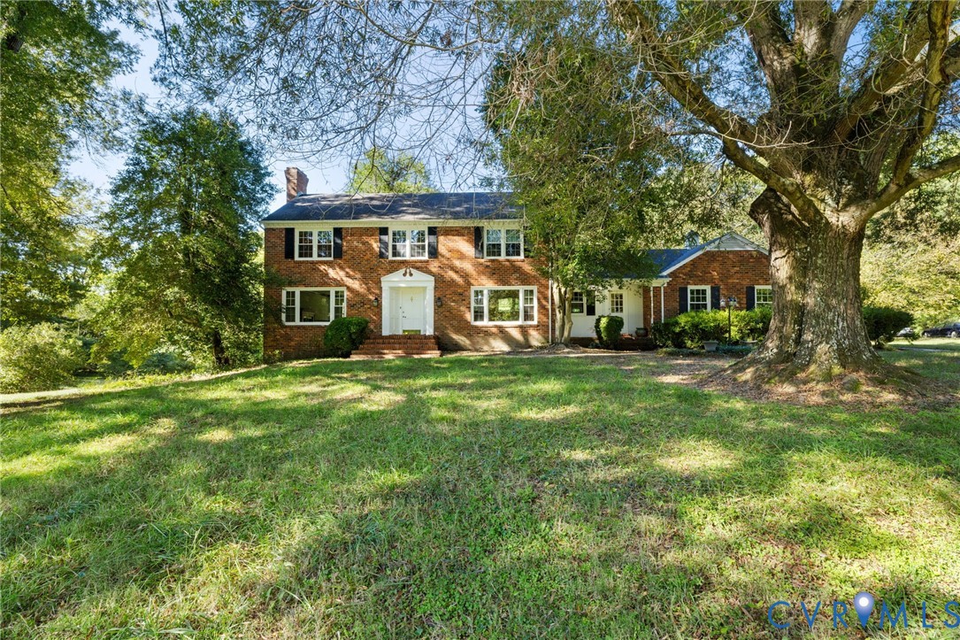 5212 Beddington Road Richmond, VA 23234 - Photo 2 of 22 front view of house with a yard