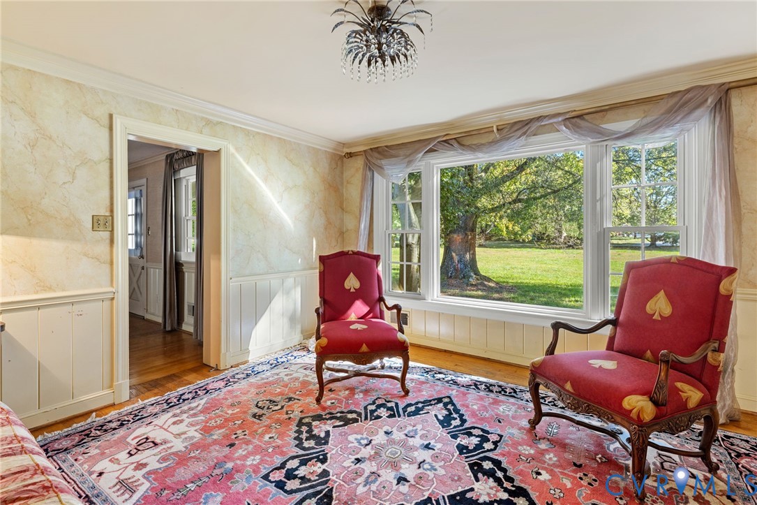 5212 Beddington Road Richmond, VA 23234 - Photo 7 of 22 a living room with furniture a rug and a large window