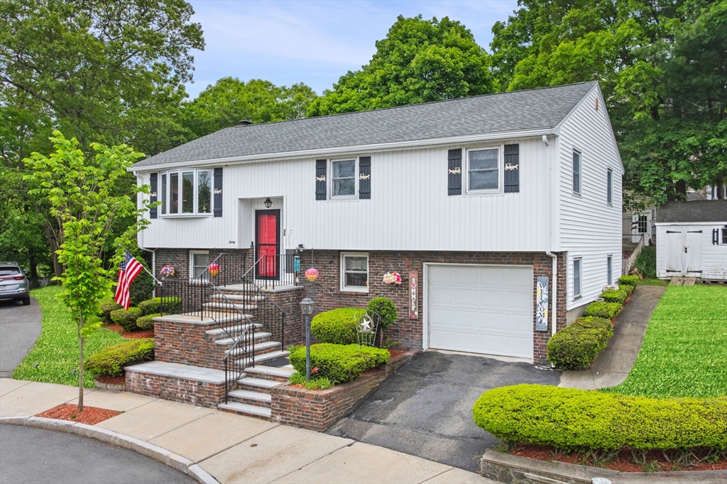 30 Lanark Road Malden, MA 02148 - Photo 2 of 40 a front view of house with a garden