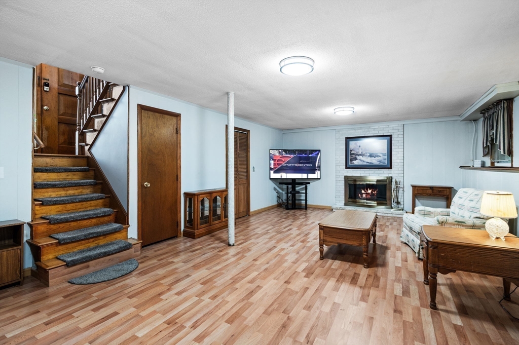 30 Lanark Road Malden, MA 02148 - Photo 27 of 40 a living room with furniture and a wooden floor