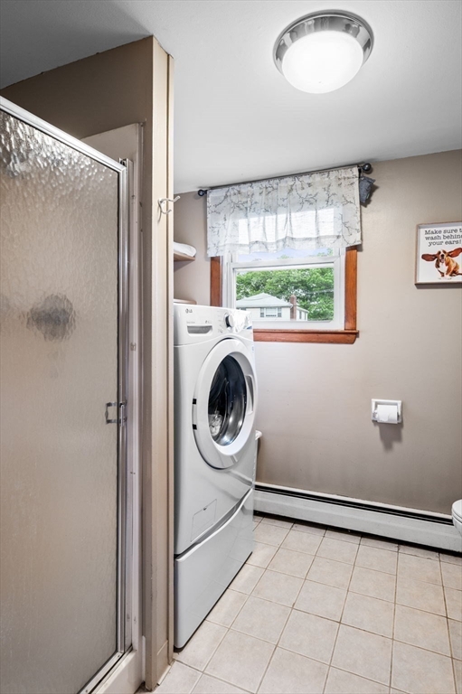 30 Lanark Road Malden, MA 02148 - Photo 31 of 40 a utility room with window dryer and washer