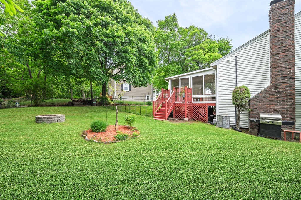 30 Lanark Road Malden, MA 02148 - Photo 6 of 40 a front view of a house with swing and a slide
