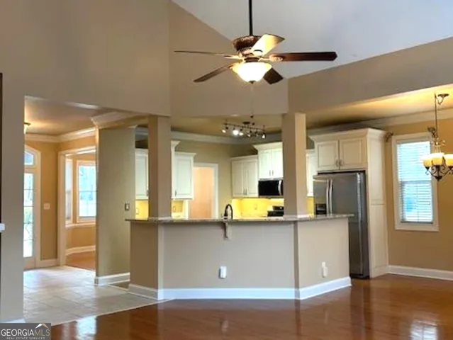 an empty room with a wooden door